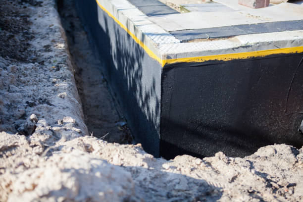 Professional Waterproofing technician working in Goodland, KS